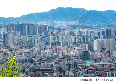 Seoul, South Korea - Mar. 08, 2026 : Panoramic cityscape of Seoul with dense residential buildings and Han River from Yongmasan observatory Seoul, South Korea - Mar. 08, 2026 : Panoramic cityscape of Seoul with dense residential buildings and Han River from Yongmasan observatory 139515958