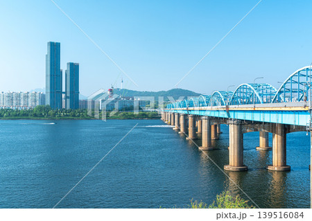 Seoul, South Korea - Mar. 01, 2026 : Scenic View of Dongjak Bridge over Han River with Namsan Seoul Tower under Clear Blue Sky in Spring Seoul, South Korea - Mar. 01, 2026 : Scenic View of Dongjak Bridge over Han River with Namsan Seoul Tower under Clear Blue Sky in Spring 139516084