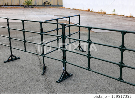 Steel railing along the park walkway. Steel railing along the park walkway. 139517353