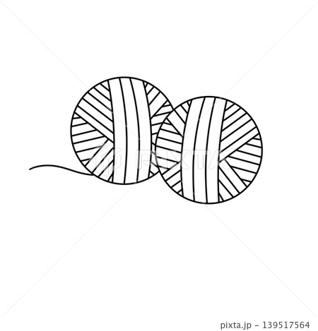 Two yarn balls rest side by side Two yarn balls rest side by side 139517564