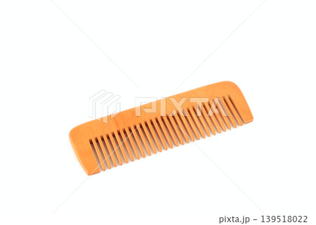 Traditional Sandalwood Hair Comb Isolated on White Background Traditional Sandalwood Hair Comb Isolated on White Background 139518022