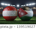 Two soccer balls in flags colors on a stadium blurred background. Austria vs Jordan. 3D image. 139519027