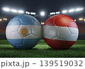 Two soccer balls in flags colors on a stadium blurred background. Argentina vs Austria. 3D image. 139519032