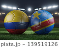 Two soccer balls in flags colors on a stadium blurred background. Colombia vs DR Congo. 3D image. 139519126