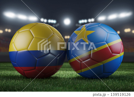 Two soccer balls in flags colors on a stadium blurred background. Colombia vs DR Congo. 3D image. Two soccer balls in flags colors on a stadium blurred background. Colombia vs DR Congo. 3D image. 139519126