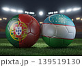 Two soccer balls in flags colors on a stadium blurred background. Portugal vs Uzbekistan. 3D image. 139519130