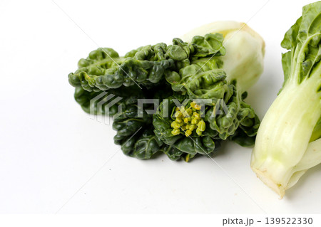 Fresh baby bok choy with crisp white green leaves. Fresh baby bok choy with crisp white green leaves. 139522330