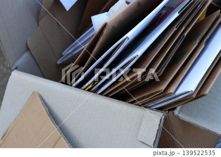 Stack of cardboard boxes and paper prepared for recycling Stack of cardboard boxes and paper prepared for recycling 139522535