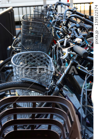 City bicycles parking on sidewalk in Japan City bicycles parking on sidewalk in Japan 139522574