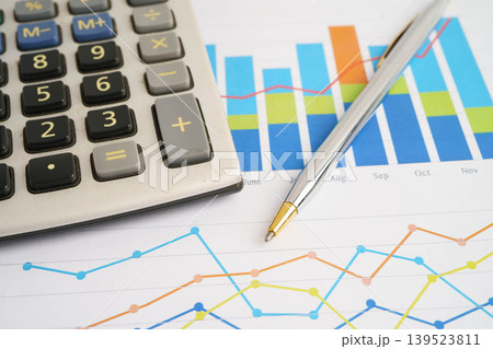 Calculator on chart graph paper. Finance, account, statistic, investment data economy, stock exchange business. Calculator on chart graph paper. Finance, account, statistic, investment data economy, stock exchange business. 139523811