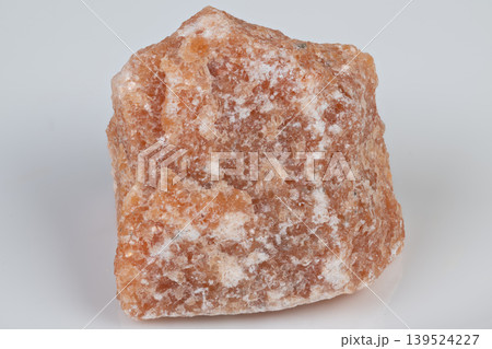 Meditation altar with sparkling translucent calcite. Decorative wellness display showcasing vibrant orange calcite with warm ambient illumination and sparkling highlights Meditation altar with sparkling translucent calcite. Decorative wellness display showcasing vibrant orange calcite with warm ambient illumination and sparkling highlights 139524227