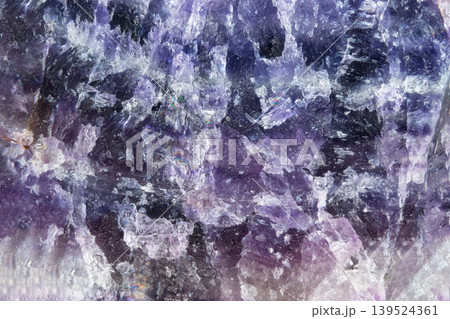 Purple crystal elegance. Luminous amethyst gemstone details. Refined textures of shimmering purple gemstones. Polished amethyst with delicate veining and luminous facets 139524361