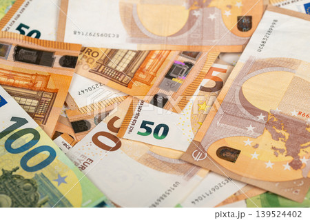 Collection of different euro currencies for worldwide trading and travel. Assortment of euro banknotes in various denominations suitable for international financial operations Collection of different euro currencies for worldwide trading and travel. Assortment of euro banknotes in various denominations suitable for international financial operations 139524402