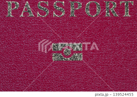 Premium textured leather passport cover with security icon. Stylish leather passport case accented with security symbol and gold embossed text for identification purposes Premium textured leather passport cover with security icon. Stylish leather passport case accented with security symbol and gold embossed text for identification purposes 139524455