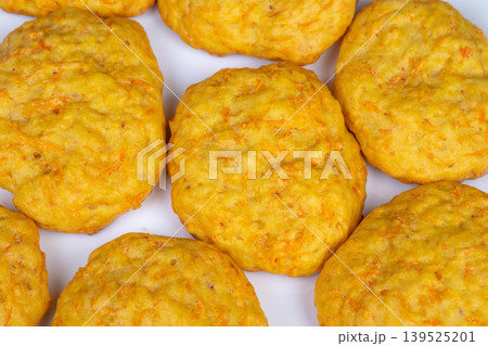 Homemade carrot treats. Family snack with cozy cookies. Comforting homemade carrot cookies for children. Warm and inviting homemade carrot cookies for family enjoyment 139525201
