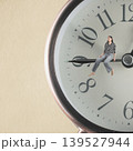 Woman experiencing time management and waiting on clock hand 139527944