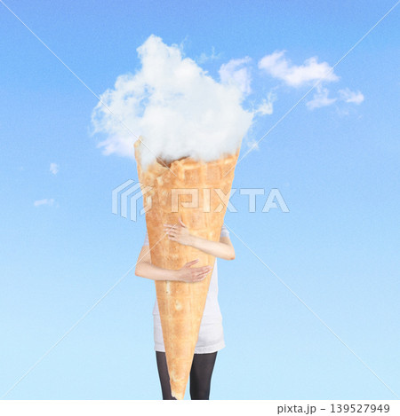 Person holding giant ice cream cone with cloud scoop 139527949