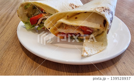 Close - up View Of Delicious Food On The Table. Rolls With Chicken And Vegetables. Close - up View Of Delicious Food On The Table. Rolls With Chicken And Vegetables. 139528937