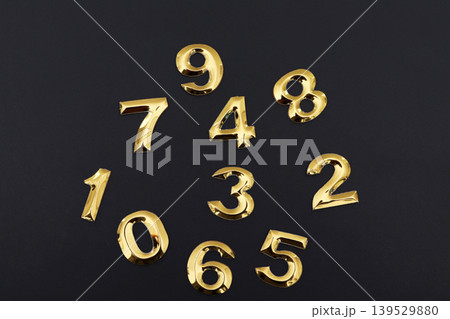 Numbers on a black background Numbers on a black background 139529880