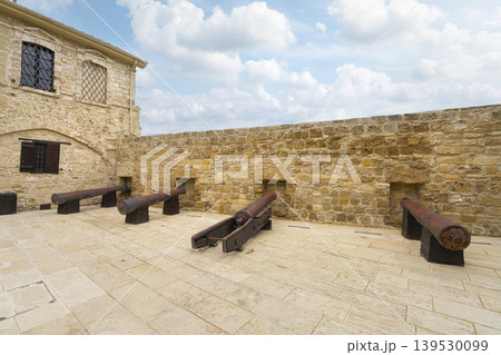 the historic cannons in the inner courtyard of the castle in Larnaka, Cyprus the historic cannons in the inner courtyard of the castle in Larnaka, Cyprus 139530099