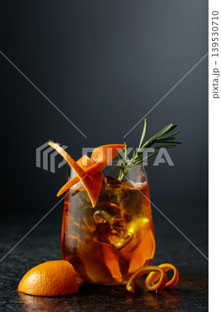 Classic Old-fashioned cocktail - whiskey, bitter, and ice. Classic Old-fashioned cocktail - whiskey, bitter, and ice. 139530710
