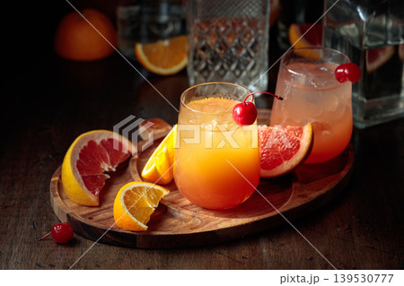 Summer cocktails with grapefruit and orange juice. Summer cocktails with grapefruit and orange juice. 139530777