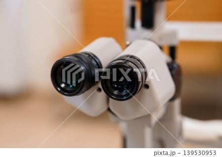 Close-up view of ophthalmology autorefractor lenses device for eye examination in clinic 139530953