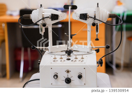 White medical slit lamp biomicroscope eye examination equipment diagnostic device 139530954