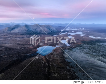 Arctic tundra landscape with moon and winding river Arctic tundra landscape with moon and winding river 139532952