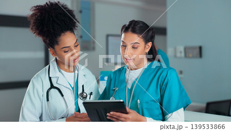 Teamwork, meeting and doctors on tablet online in hospital for research, report advice and telehealth. Healthcare, clinic and women talking on digital tech for medical service, results and discussion 139533866