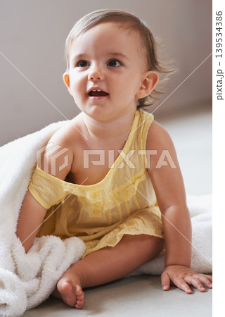 Baby, girl and blanket or toddler at home, child development and curious for childhood. Female person, healthy kid and sweet or comfort at house, peaceful and playing on floor or relaxing for growth Baby, girl and blanket or toddler at home, child development and curious for childhood. Female person, healthy kid and sweet or comfort at house, peaceful and playing on floor or relaxing for growth 139534386