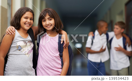 Girl, portrait and happy in corridor with friend or backpack for learning, education or knowledge at school. Student, person or face with smile in building or hallway before class or ready to study Girl, portrait and happy in corridor with friend or backpack for learning, education or knowledge at school. Student, person or face with smile in building or hallway before class or ready to study 139534423