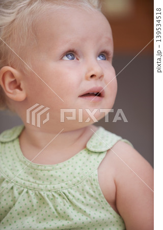 Baby, kid and girl play in home, adorable and cute child closeup alone in house. Young blonde toddler, innocent and childhood development for learning, education and thinking in kindergarten nursery Baby, kid and girl play in home, adorable and cute child closeup alone in house. Young blonde toddler, innocent and childhood development for learning, education and thinking in kindergarten nursery 139534518