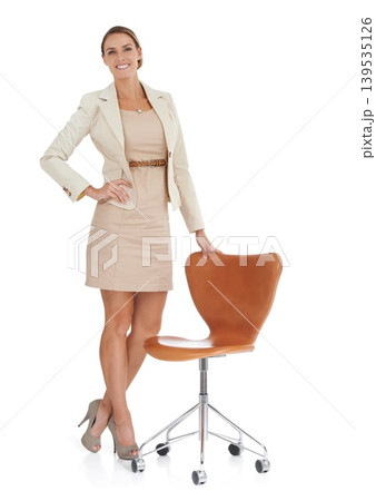 Businesswoman, professional and smile in portrait, pride and confidence in studio by white background. Female person, worker and happy face for career, relaxing and chair or opportunity and positive 139535126