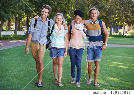 College, students and portrait in the park with friends on campus to study together with happiness. University, academy and people with diversity or support in education or walking in garden to class College, students and portrait in the park with friends on campus to study together with happiness. University, academy and people with diversity or support in education or walking in garden to class 139535958