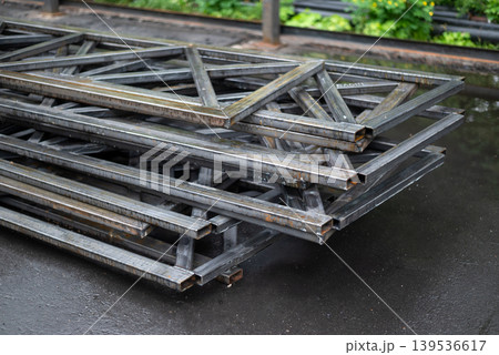 Stack of welded steel rectangular frames for construction and industrial metalwork manufacturing. 139536617