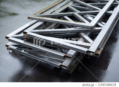 Stack of welded steel rectangular frames for construction and industrial metalwork manufacturing. 139536619