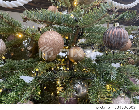 Decorated Christmas tree with ornaments and lights, showcasing festive holiday spirit background Decorated Christmas tree with ornaments and lights, showcasing festive holiday spirit background 139536905
