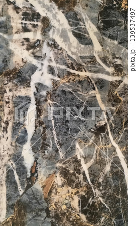 Dark grey marble with artistic white and purple veins. Dark grey marble with artistic white and purple veins. 139537497
