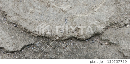 Rough concrete surface texture with cracked edge background. Rough concrete surface texture with cracked edge background. 139537739