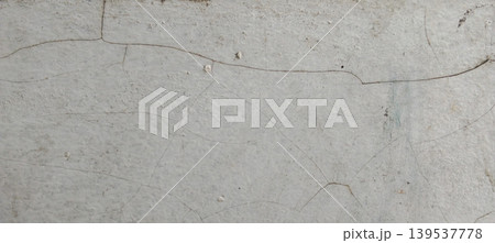 Cracked gray concrete walls with a minimalist rough texture. 139537778