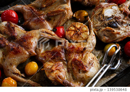 grilled quail meat, on a platter, tobacco, in the oven, with spices, homemade, without people, grilled quail meat, on a platter, tobacco, in the oven, with spices, homemade, without people, 139538648