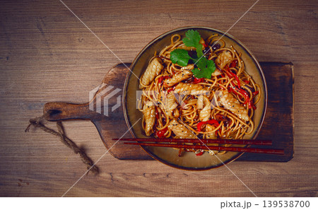 udon noodles, with squid and vegetables, on a wooden table, homemade, no people, udon noodles, with squid and vegetables, on a wooden table, homemade, no people, 139538700
