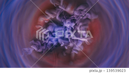 Blur swirling fluid. Paint background. Defocused pink purple color vapor flow fog liquid spreading on creative acrylic art abstraction. Blur swirling fluid. Paint background. Defocused pink purple color vapor flow fog liquid spreading on creative acrylic art abstraction. 139539023