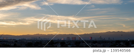 Las Vegas Nevada Skyline with Stratosphere Tower and Desert Mountain Backdrop from Daylight Las Vegas Nevada Skyline with Stratosphere Tower and Desert Mountain Backdrop from Daylight 139540566