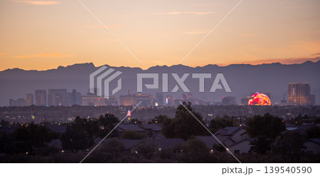 Las Vegas Nevada Skyline with Stratosphere Tower and Desert Mountain Backdrop Las Vegas Nevada Skyline with Stratosphere Tower and Desert Mountain Backdrop 139540590