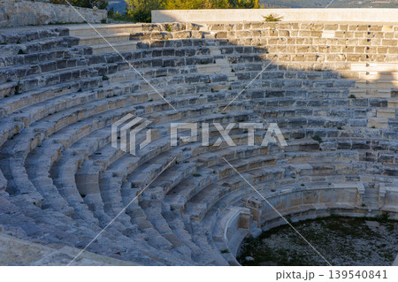 Ancient stone theater tiers at a historic archaeological ruin site 139540841