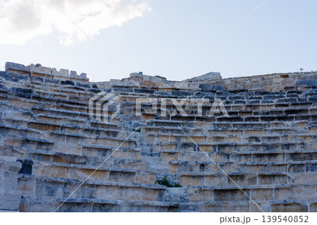 Ancient stone theater seating in a historic archaeological site Ancient stone theater seating in a historic archaeological site 139540852
