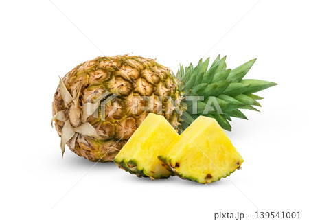 pineapple with leaf and cut in a slice of ananas isolated. pineapple with leaf and cut in a slice of ananas isolated. 139541001
