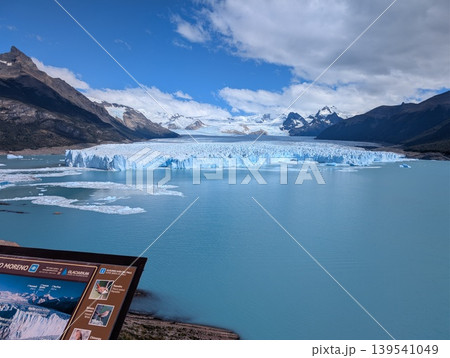 Los Glaciares National Park, Santa Cruz Province, Argentina - March 10, 2026: Map of the Perito Moreno Glacier and view of the glacier. Los Glaciares National Park, Santa Cruz Province, Argentina - March 10, 2026: Map of the Perito Moreno Glacier and view of the glacier. 139541049